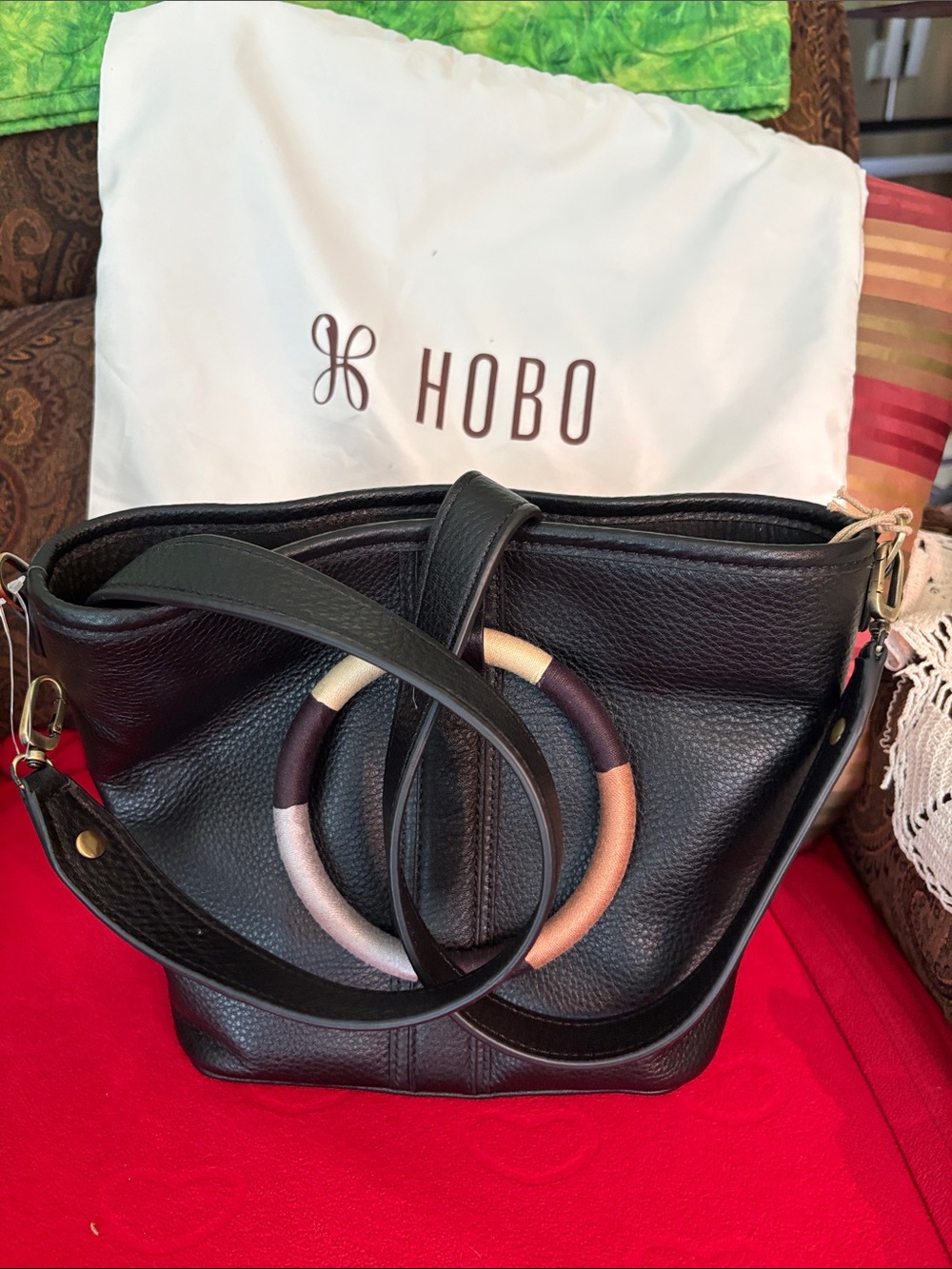 HOBO Black Pebbled Leather Hobo with Multicolor Ring Accent